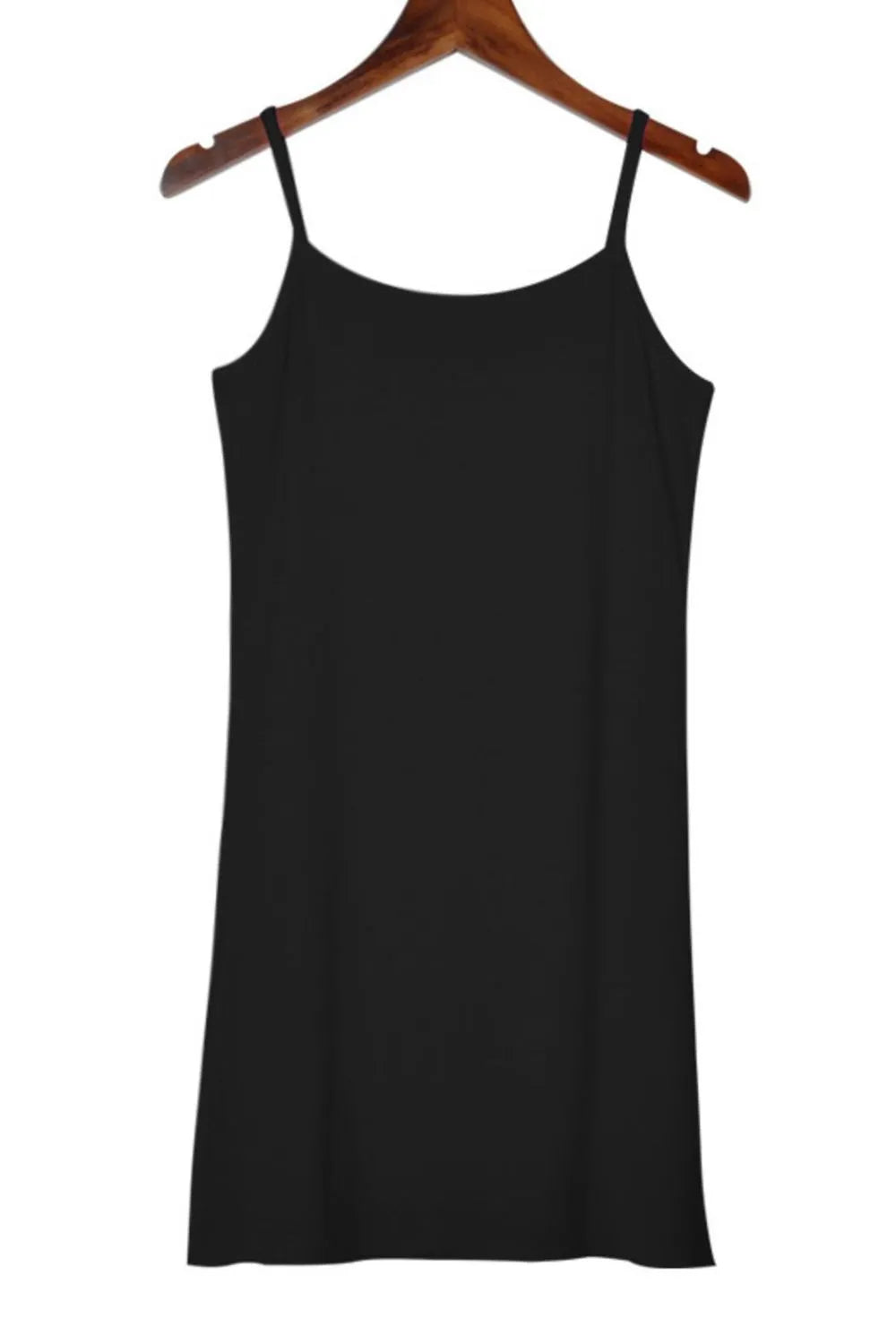 11. Model in scoop neck mini cami dress walking confidently in natural light