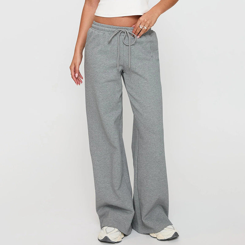 apricot drawstring trousers casual fit polyester fabric texture close up