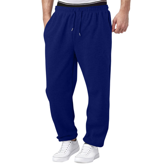 men's casual sweatpants mid waist thick fabric in dark green styled with sneakers for relaxed weekend errands