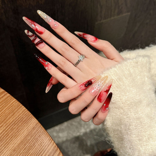 Chinese style red manicure – butterfly and bow accents