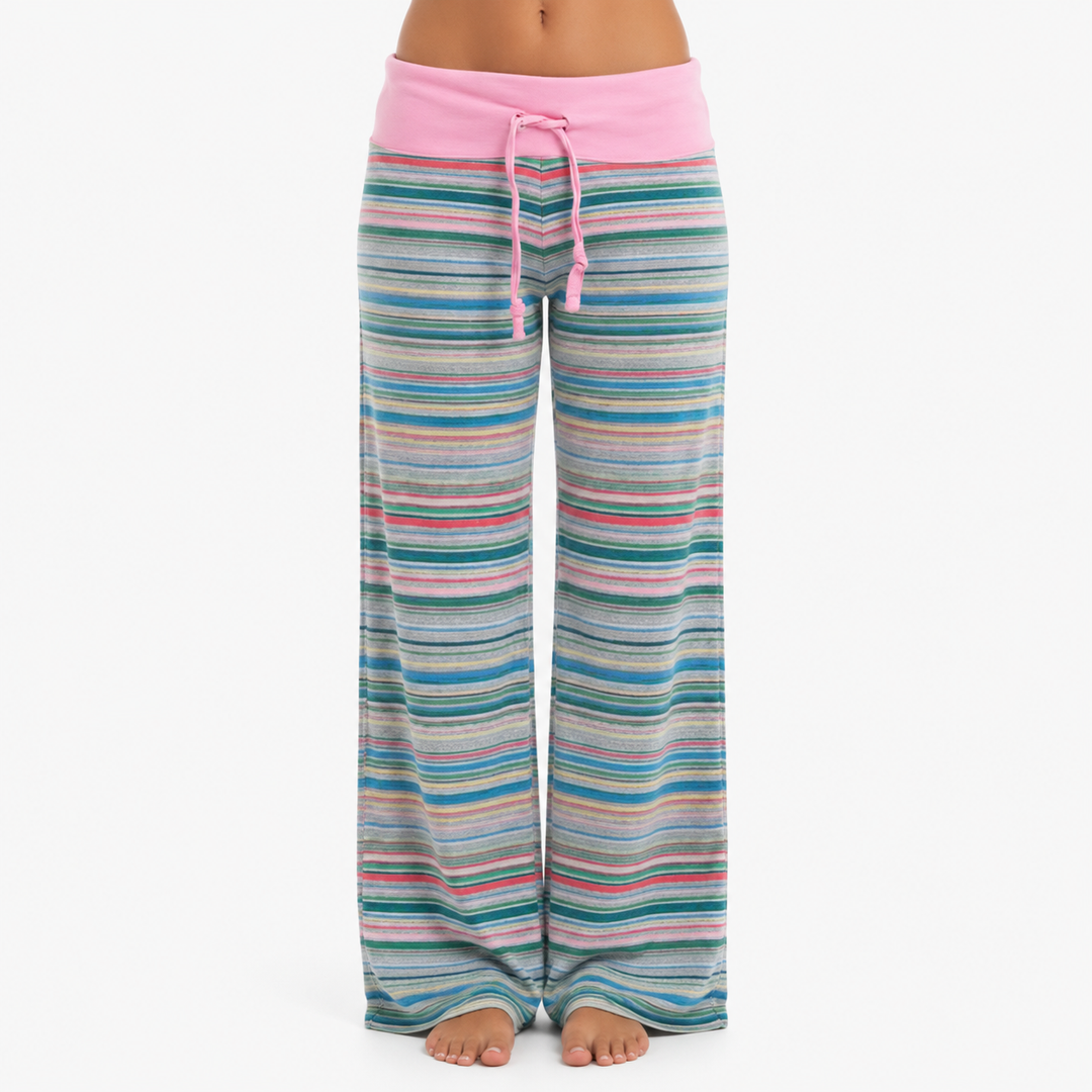Pink striped wide leg pants shown from the front on model, with fold-over waistband, center drawstring and full-length shape.