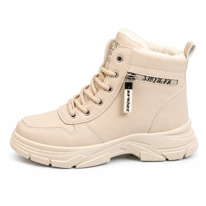 Side view of a Khaki plush lined ankle boot with a chunky sculpted sole