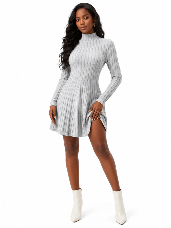 Long sleeve mini dress featuring a ribbed finish, mock neckline, slight stretch and an unlined polyester-spandex body design.
