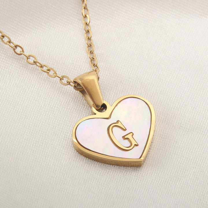 Stainless steel letter necklace with heart-shaped pendant, gold-plated finish and alphabet initial choices - Online shopping.