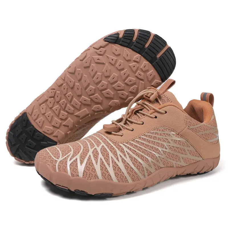 Brown unisex slip-on hiking shoes shown with one outsole raised to show the segmented sole and black traction zones on white.