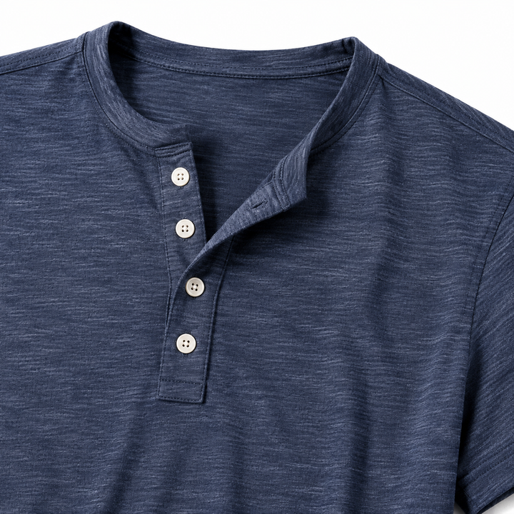 Close-up of Henley neckline, four-button placket, seams and heather fabric texture