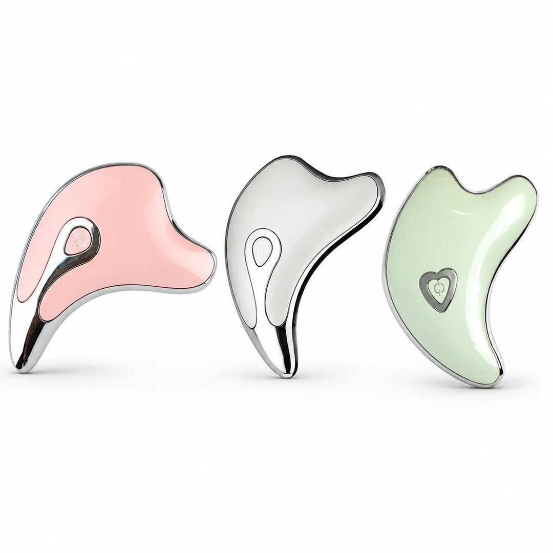 Pink, Silver and Mint Green massage tools lined side by side on white, showing each distinct shape, color and control design.