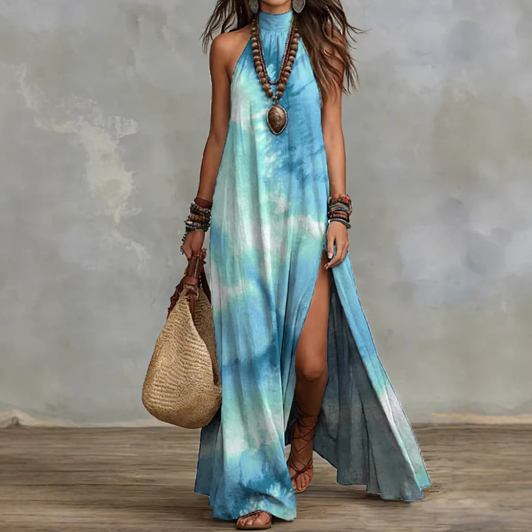 Teal printed summer maxi dress with side slit, loose fit and elegant halter neckline for travel, casual wear and dancing