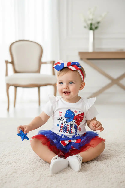 baby girl patriotic outfit matching headband bow in red white blue flag pattern styled with romper and shorts set
