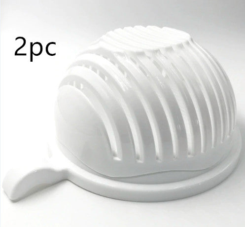Clean white salad cutter bowl product shot on a minimalist light gray background
