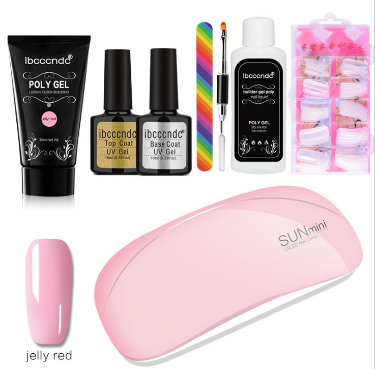 Woman sculpting DIY gel nails at home using poly gel nail kit with mini UV lamp

