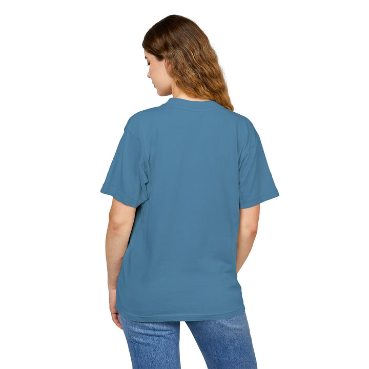 Person wearing a blue t-shirt and jeans on a white background