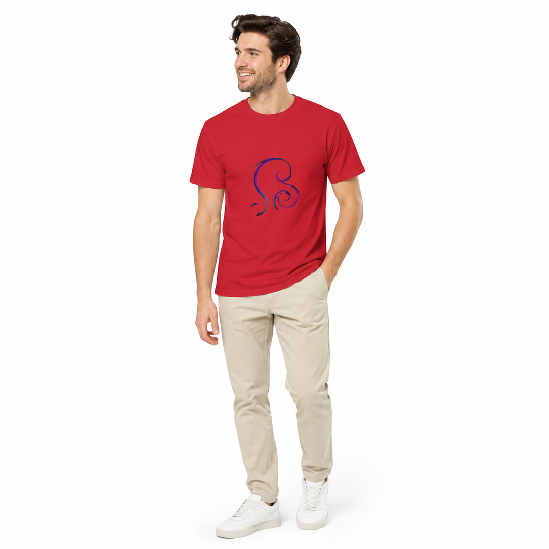 A man wearing a red crewneck t-shirt with a blue and purple stylized graphic on the chest, paired with beige pants and white sneakers, standing against a plain white background.