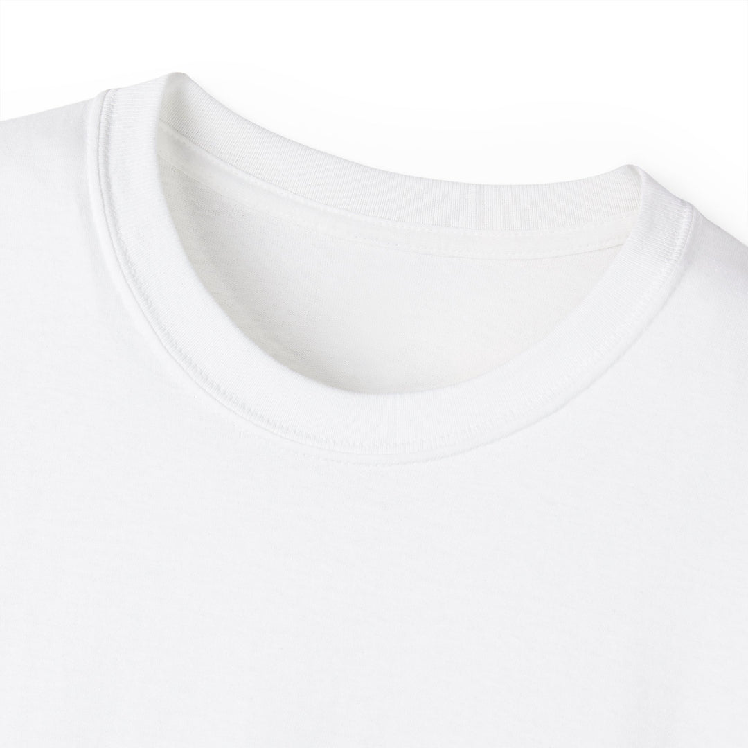 Close-up of a white t-shirt with a plain background