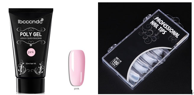 Woman applying nail extension gel with dual brush over nail form for smooth shaping
