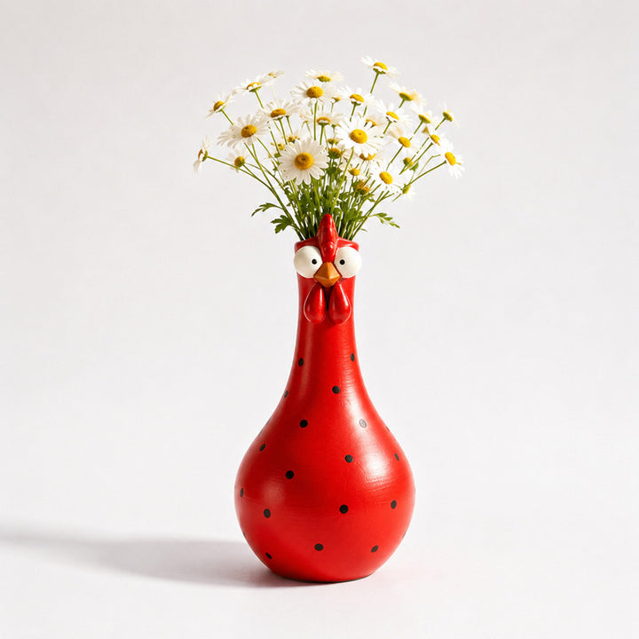 Colorful rooster sculpture with long neck, polka-dot details and resin construction shown as tabletop decorative home accent.