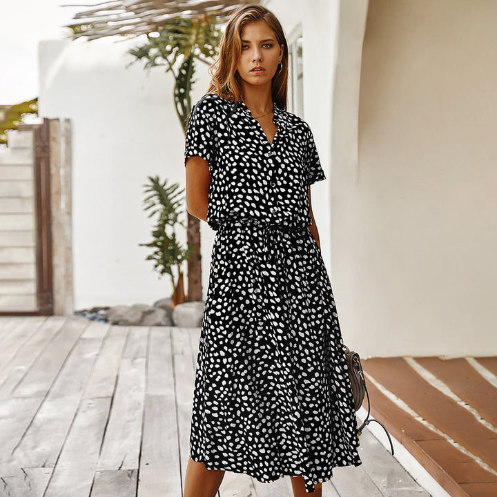 polka dot chiffon dress feminine drape movement walking outdoor scene