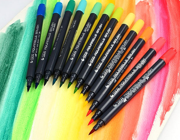 Water based brush markers flat lay showing full color range for creative projects