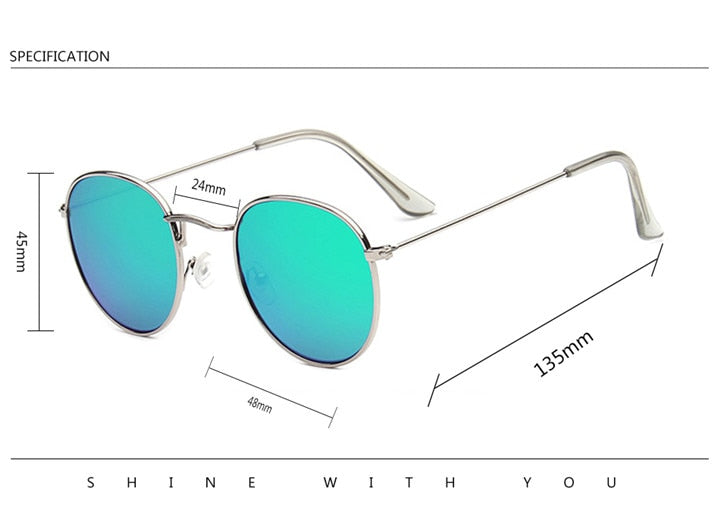 Vintage round sunglasses for women styled on a professional model, showing the circular profile and slim metal frame details.