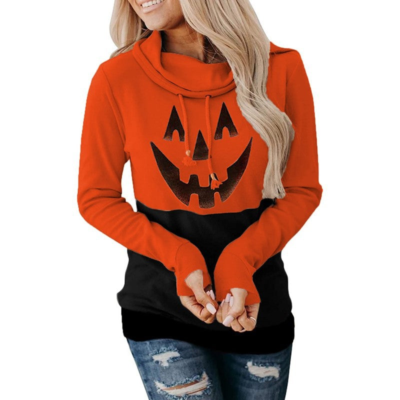 Supplier photo of a pumpkin orange and black pullover with a pumpkin face graphic, long sleeves and folded drawstring collar.