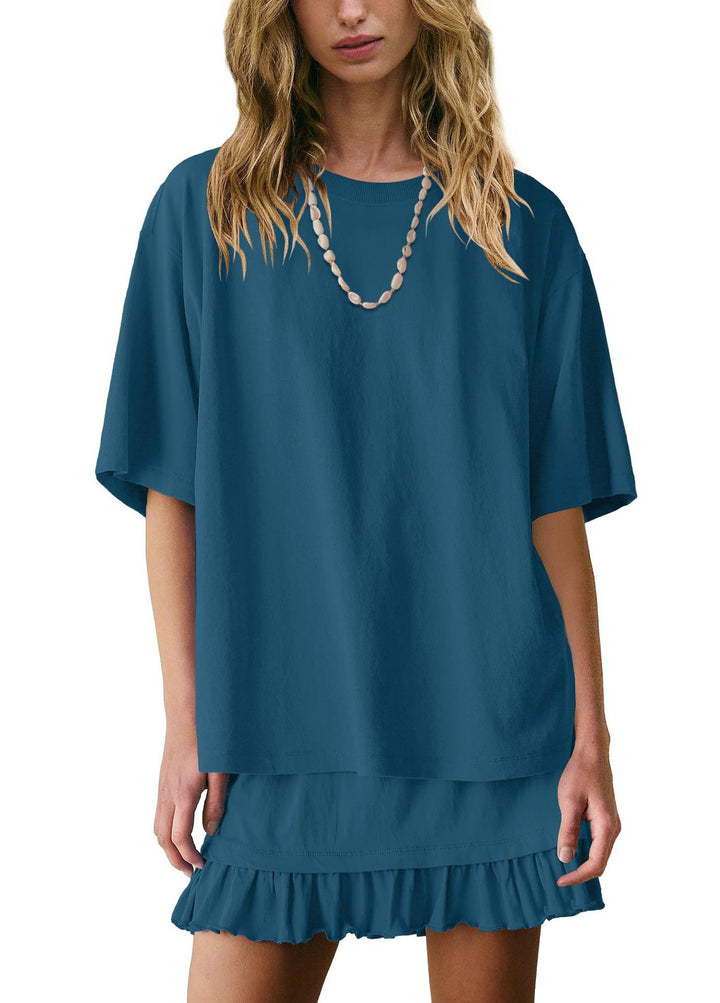 Elegant short sleeve skirt set for women featuring loose top, mini ruffle skirt, and versatile commuter casual styling.