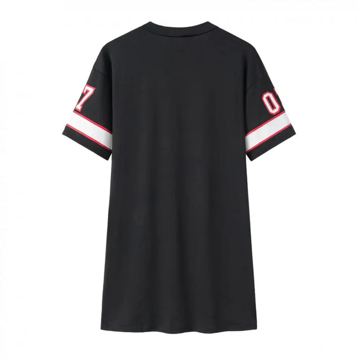 Back view of the black QUEEN 07 dress showing its plain back and striped short sleeves.