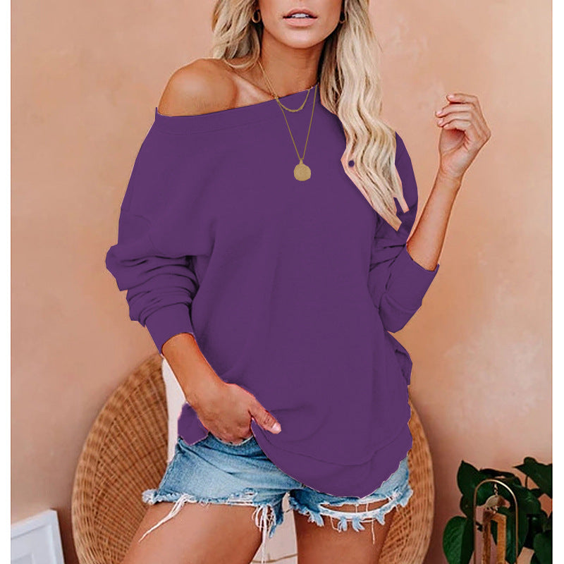 Woman wearing a purple off-shoulder top against a beige background