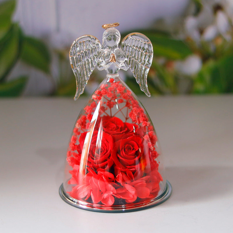 eternal flower gift box angel glass cover beside greeting card for New Year gifting and entryway shelf decor
