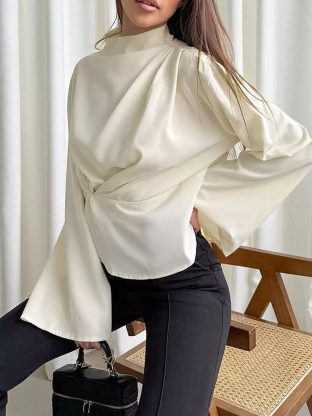 Going out ruched top mock neck blouse paired with satin skirt evening outfit look sleek long sleeves and ruching

