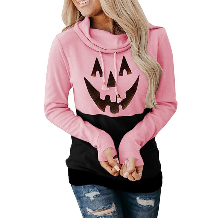 Supplier photo of a soft pink and black pullover with a pumpkin face graphic, long sleeves and folded collar with drawstrings