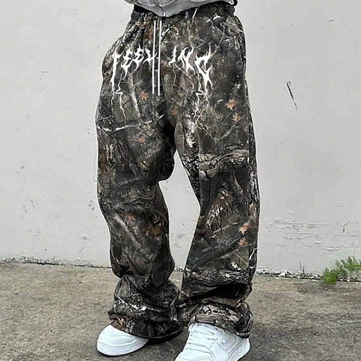 mens printed pants catalog image 1 showing slight stretch and polyester details with verified product information for review.