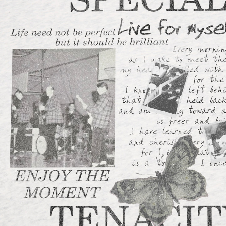 Close-up of the front collage print showing band photograph, handwritten lettering, a butterfly and ENJOY THE MOMENT wording.