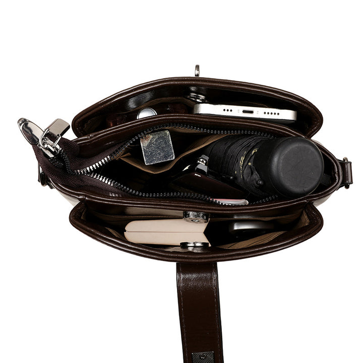 daily messenger bag women with structured form and refined hardware close-up lifestyle view