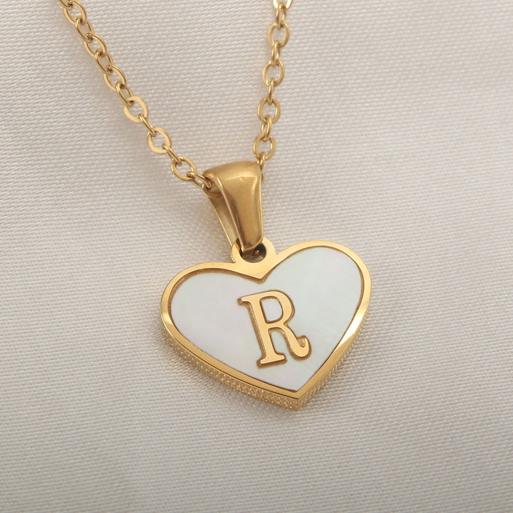 Heart initial necklace with selectable alphabet letters A to Z, gold-plated finish and stainless steel - For online shopping.