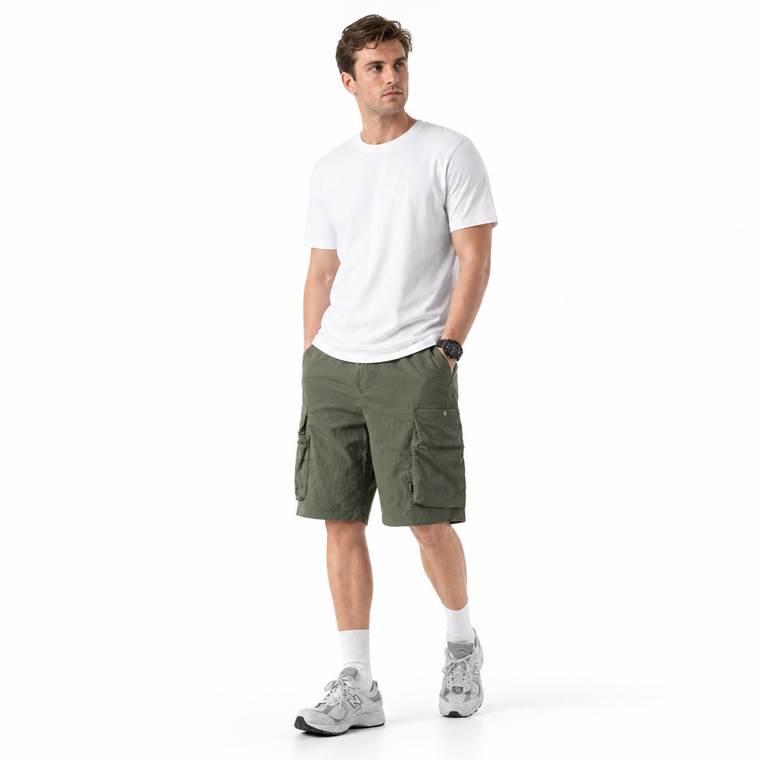 Men’s multi pocket cargo shorts shown from the front with relaxed leg shape