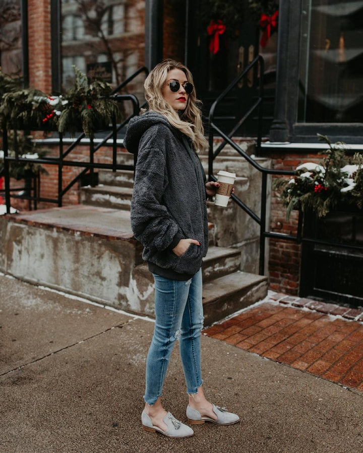 women’s fleece hoodie black long sleeve drape minimal winter styling context