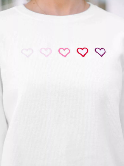 heart embroidered oversized sweatshirt sleeve detail with ribbed cuff and smooth seams for comfortable all-day wear
