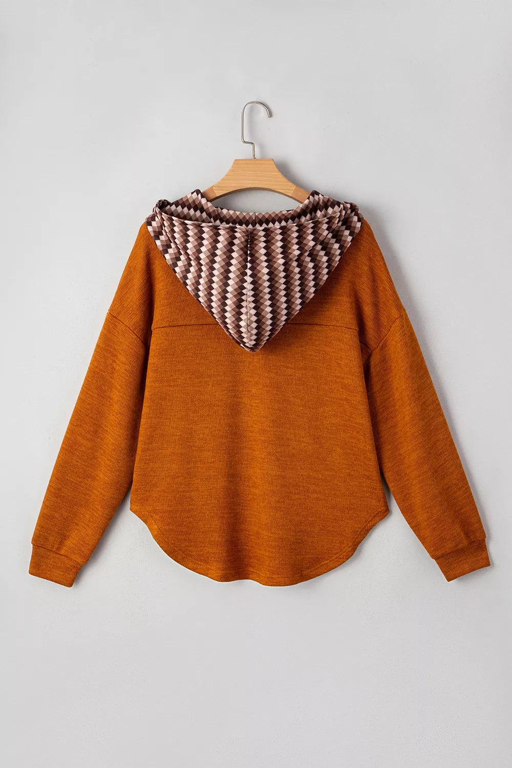 machine washable women's henley hoodie care tag closeup