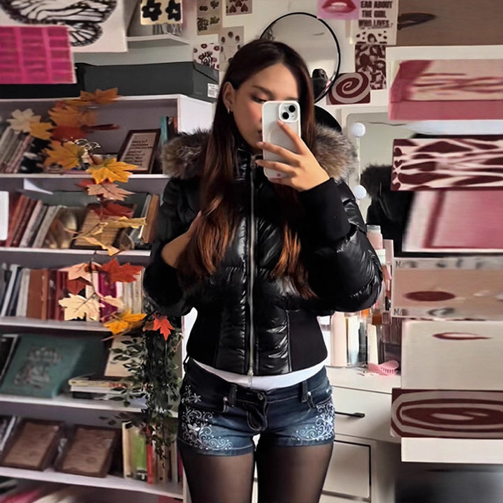 Detachable sleeve hooded coat pocket detail with cinched waist silhouette, waist cinching winter jacket look
