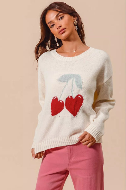 Cherry heart sweater worn casually with jeans for romantic day look