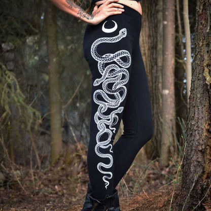 "Bold white snake illustration on black yoga leggings, comfortable polyester tights for gym classes and casual wear"