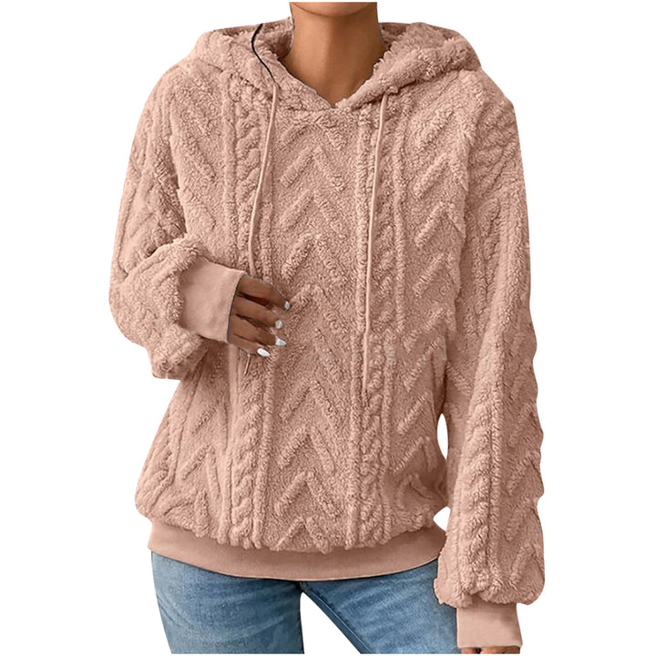 Khaki textured hoodie on a model, shown from the front. The textured fabric appears in the pictured style and garment design.