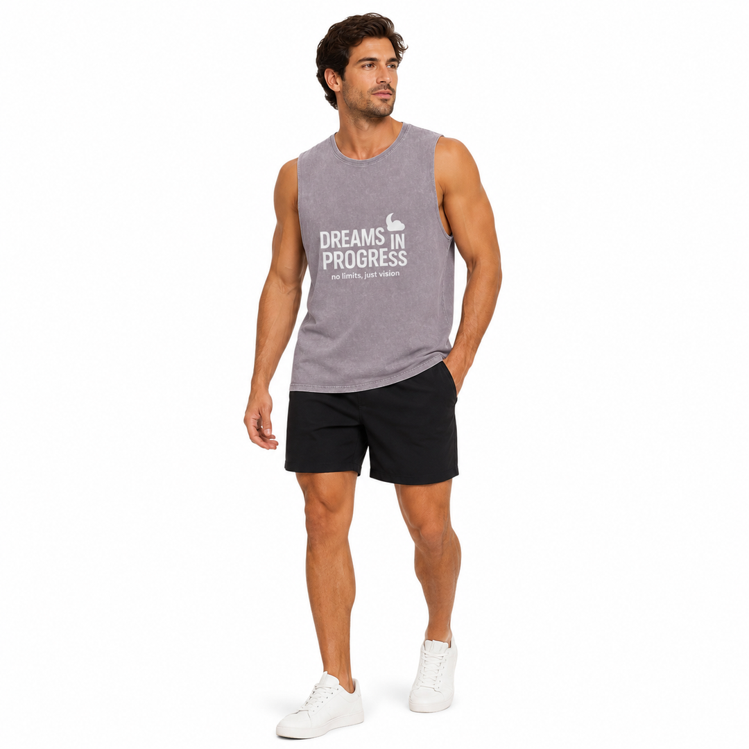 Man wearing a gray sleeveless shirt with &