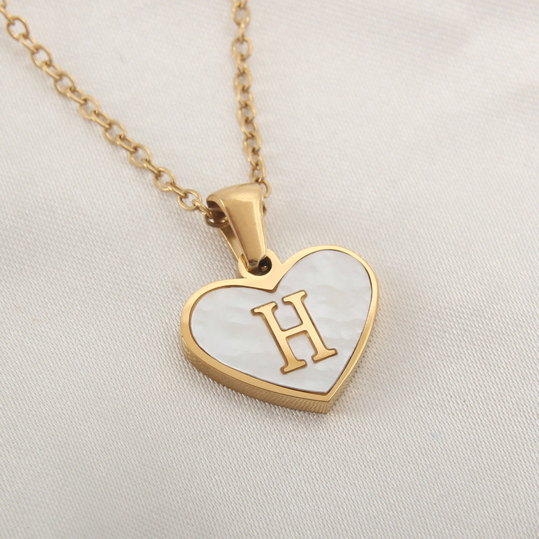 Alphabet heart necklace with gold-plated finish, stainless steel material and selectable letters A through Z - Product image.