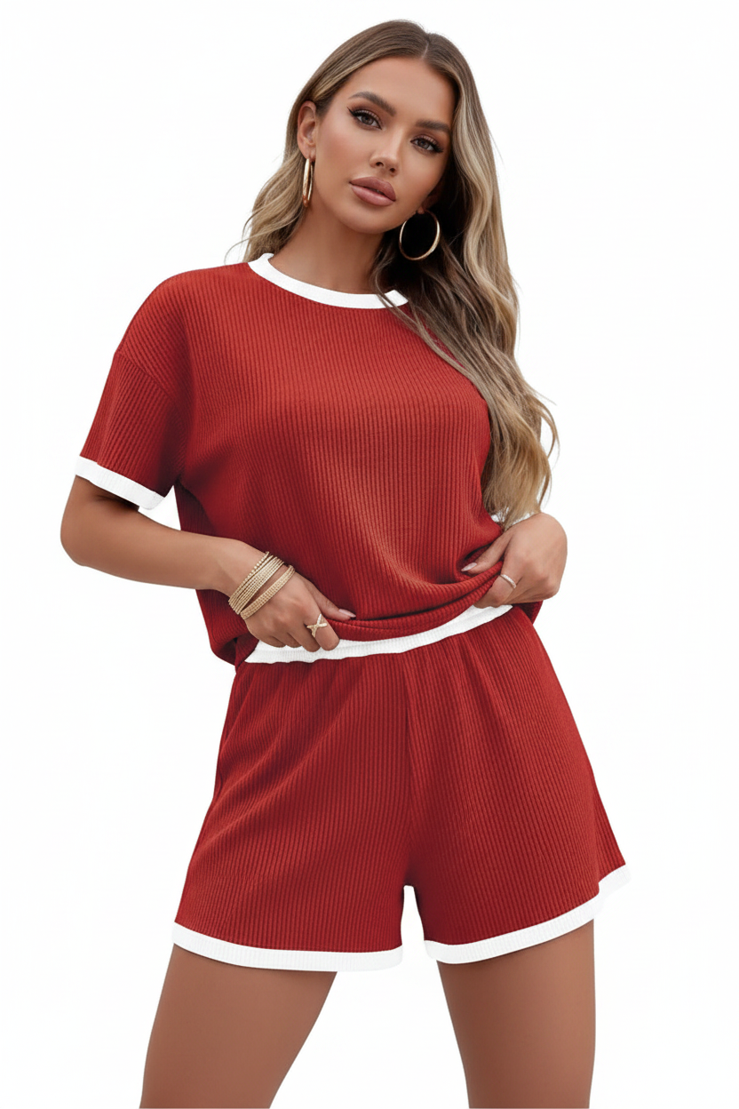 Women's striped casual set in light blue, relaxed T-shirt and wide-leg pants, worn by model outdoors
