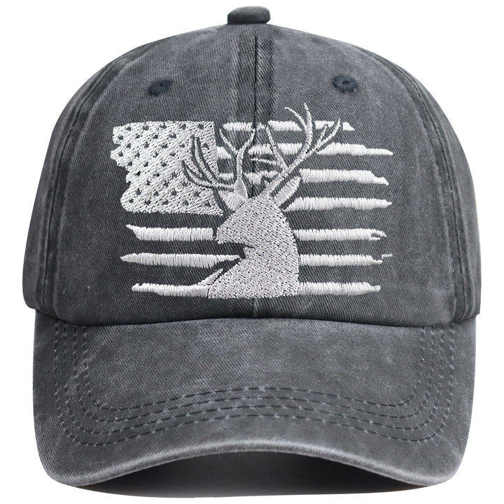 Close-up texture showing soft washed cotton weave and stitched American flag deer embroidery detail