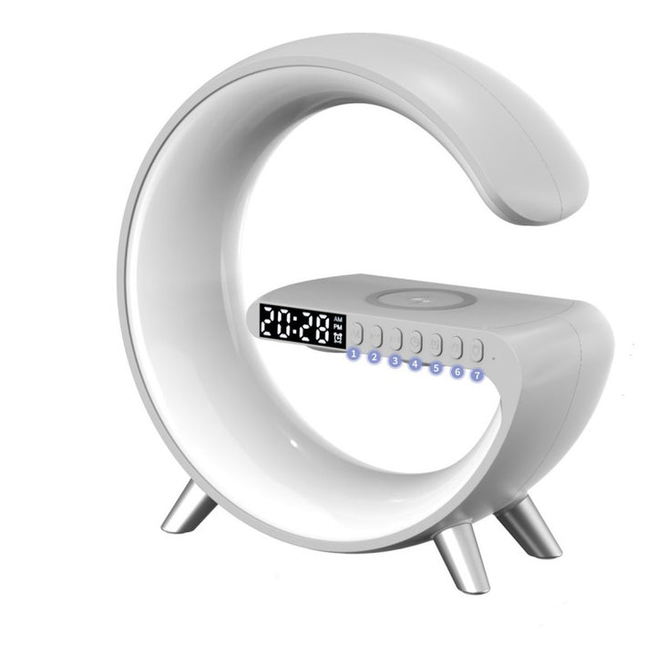 Multifunction LED lamp with ten light color modes, dimmable brightness, Bluetooth speaker, wireless charger, clock and alarm.