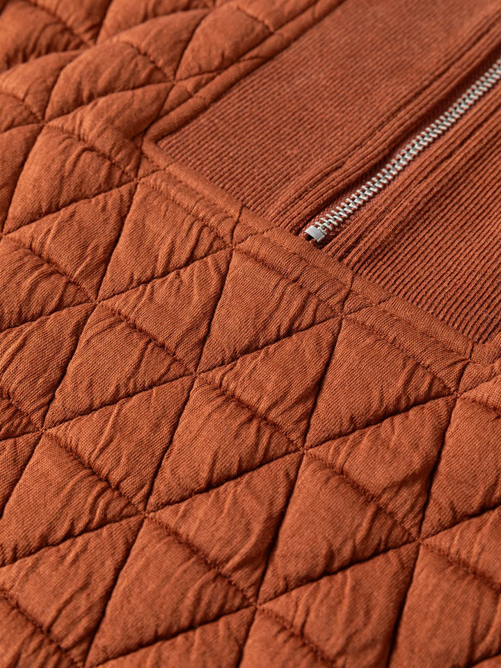  Folded stack geometric quilted half-zip sweatshirts in all colors soft fabric texture