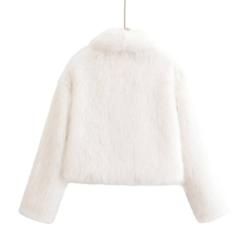 Back view of the white cropped jacket on the hanger, displaying long sleeves, dropped shoulders and a straight lower hemline.