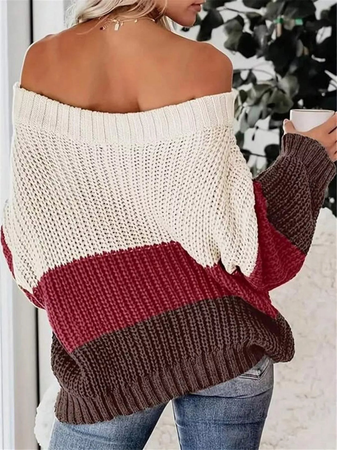 women off shoulder sweater styled with minimal accessories